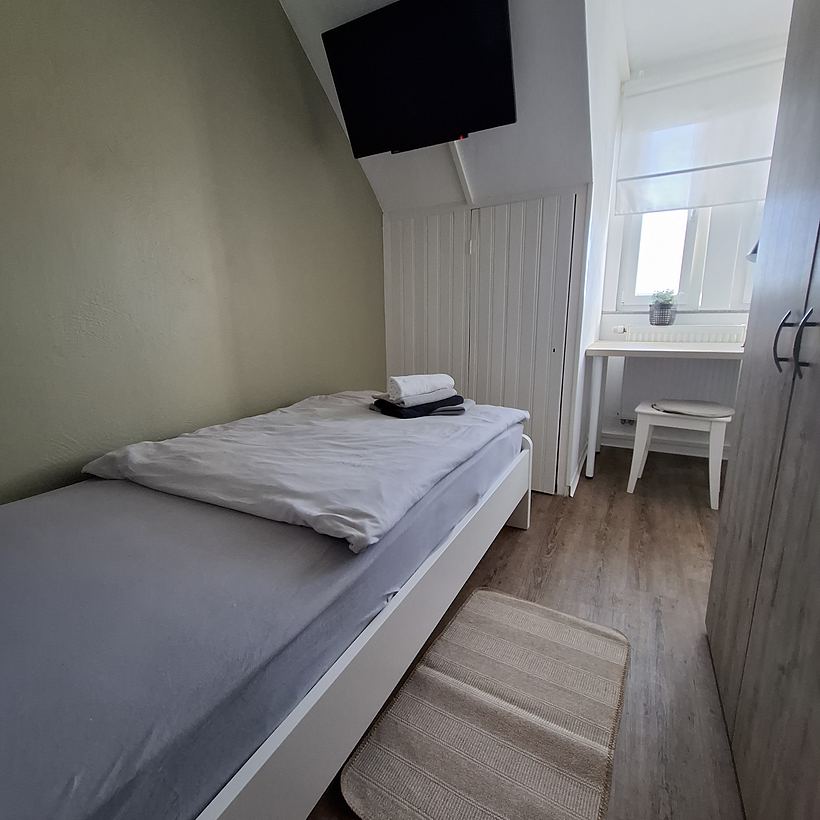 Schlafzimmer 4 (1 von 2) – 2. Obergeschoss in Mündersbach