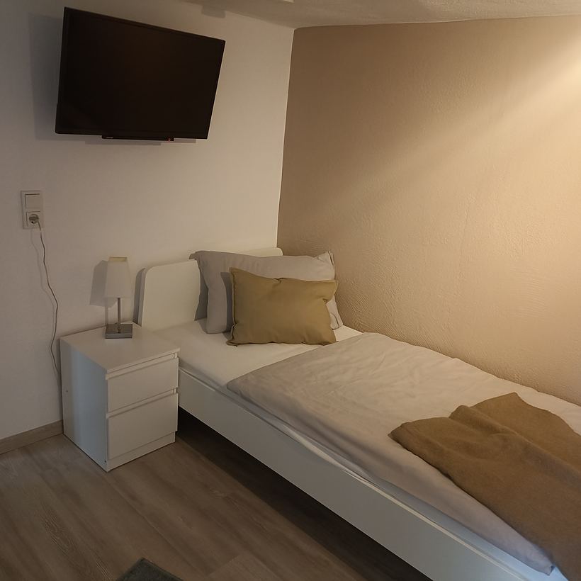 Schlafzimmer 2 (1 von 2) – Apartment 1, „Am Weiherplatz“ in Norken