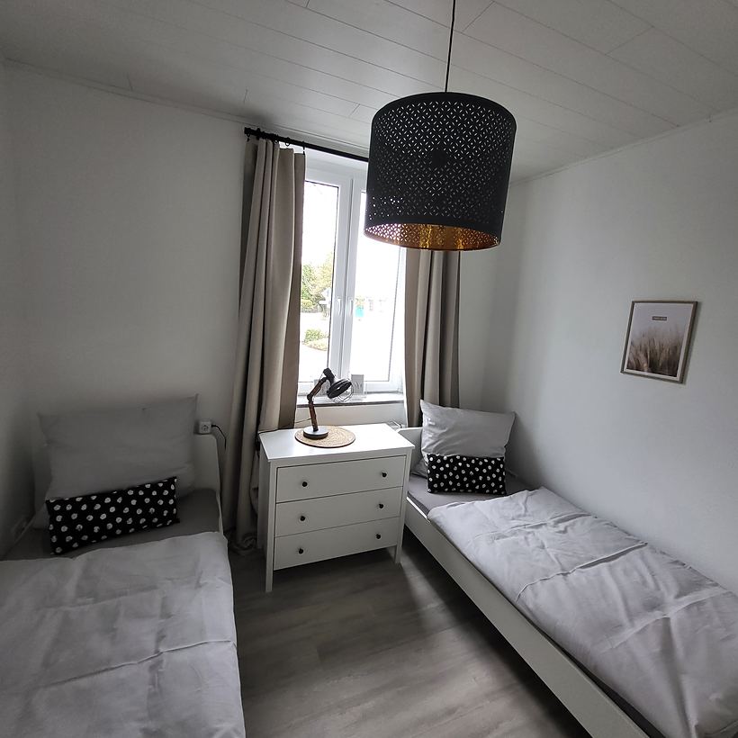 Schlafzimmer 1 – Apartment 3, „Am Weiherplatz“ in Norken