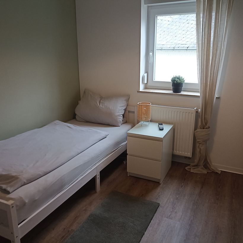 Schlafzimmer 2 – Apartment „Zur Tenne“, Norken
