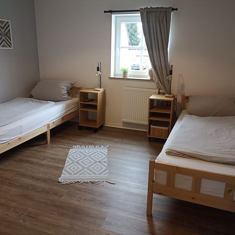Schlafzimmer 4 (1 von 2) – Apartment „Zur Tenne“, Norken